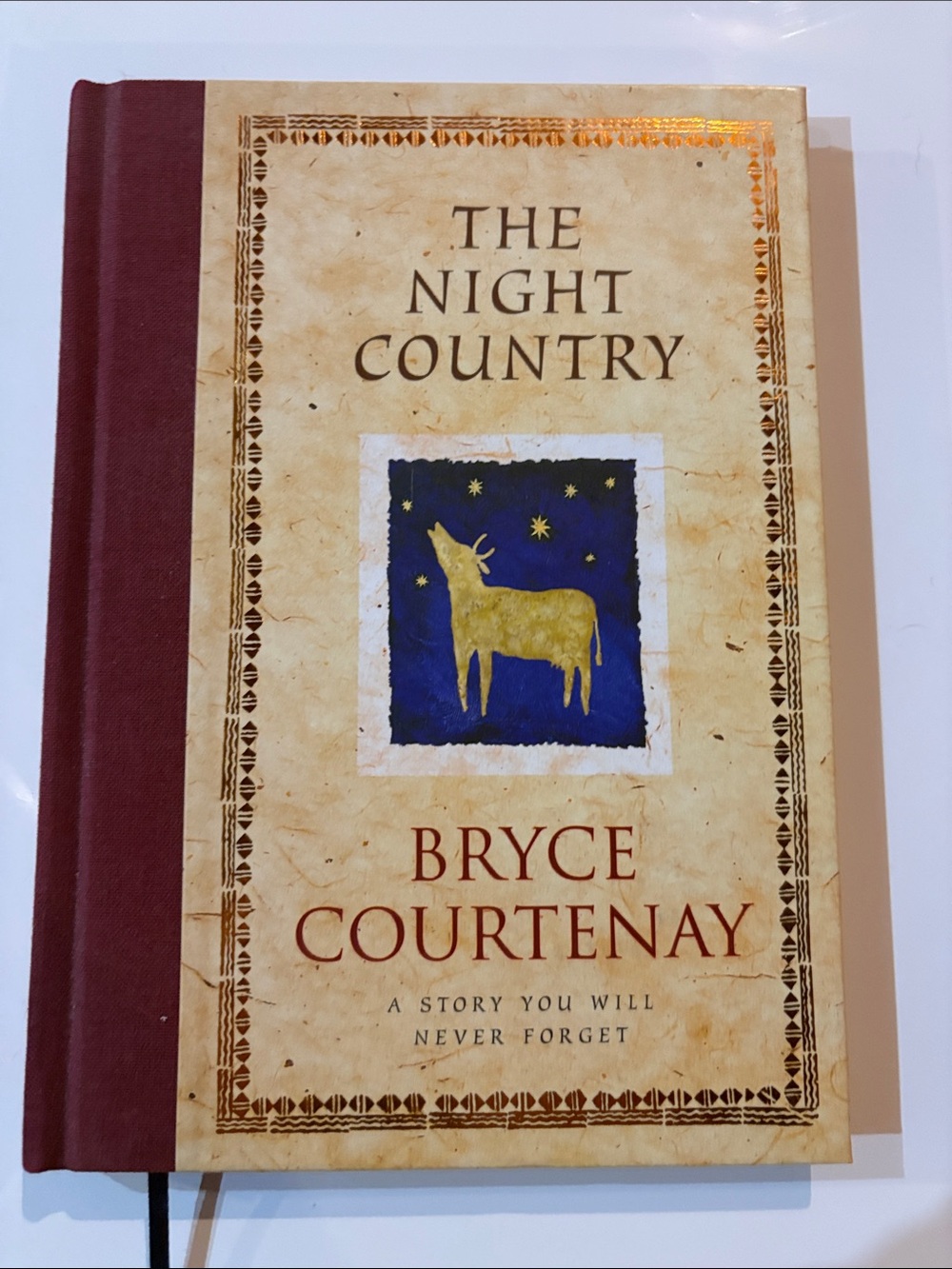Bryce Courtenay 'The Night Country' Decorative Hardcover Book - Maroon & Cream